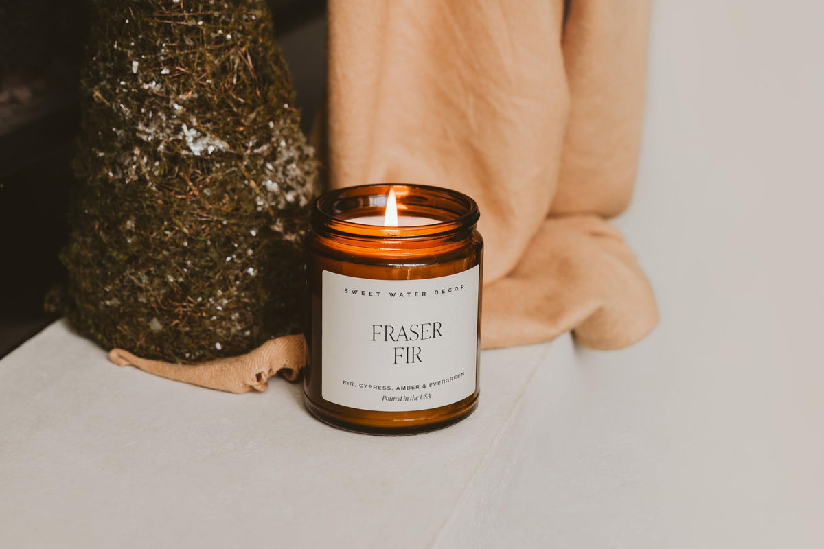 Sweet Water Decor Fraser Fir Candle, 9oz Amber Glass Jar, Winter Scent